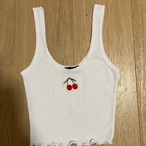 Pretty Little Thing cropped white tank top with cherry logo. size xs
